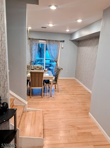149 Smith Street Newark, NJ 07106 - Photo 18 of 20 a view of a dining room with furniture