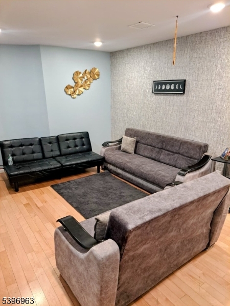 149 Smith Street Newark, NJ 07106 - Photo 20 of 20 a living room with furniture