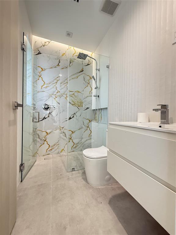 12245 Southwest 29th Terrace Miami, FL 33175 - Photo 16 of 23 a bathroom with a toilet and a shower