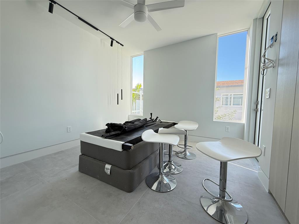 12245 Southwest 29th Terrace Miami, FL 33175 - Photo 17 of 23 a living room with a couch and a table