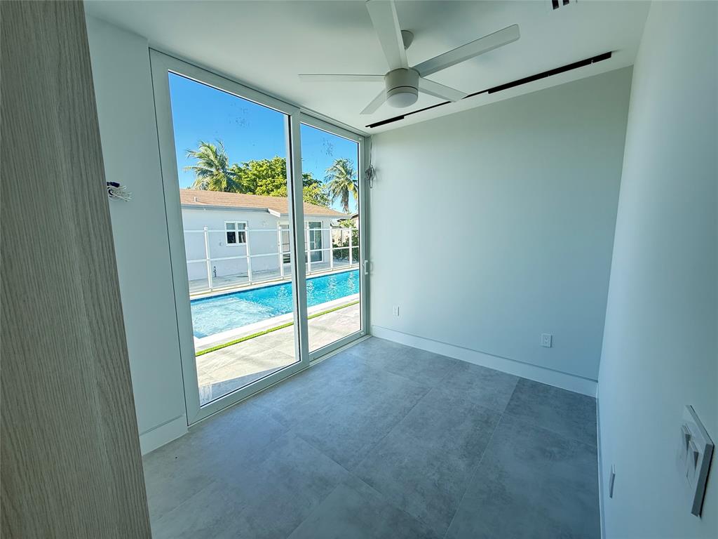 12245 Southwest 29th Terrace Miami, FL 33175 - Photo 19 of 23 a view of an empty room and a window