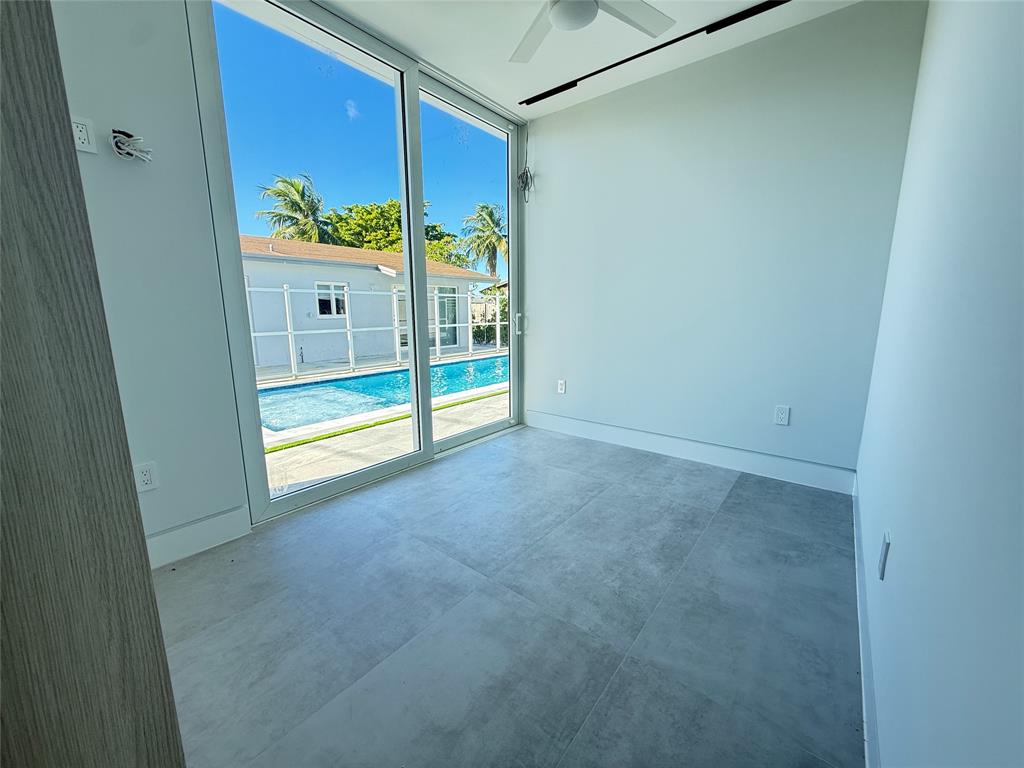 12245 Southwest 29th Terrace Miami, FL 33175 - Photo 20 of 23 a view of an empty room and a window