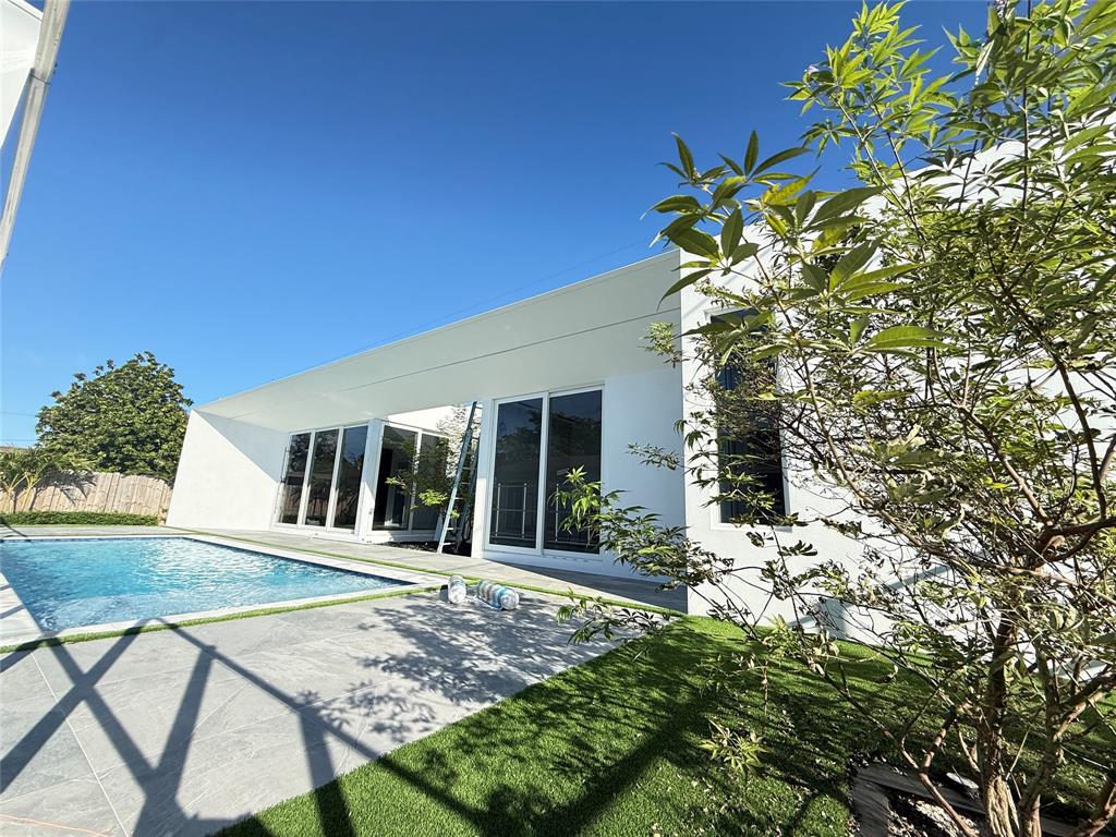 12245 Southwest 29th Terrace Miami, FL 33175 - Photo 2 of 23 a view of a house with backyard and sitting area