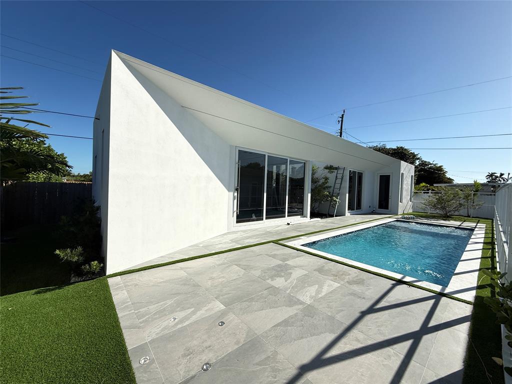 12245 Southwest 29th Terrace Miami, FL 33175 - Photo 23 of 23 a view of a house with backyard and porch