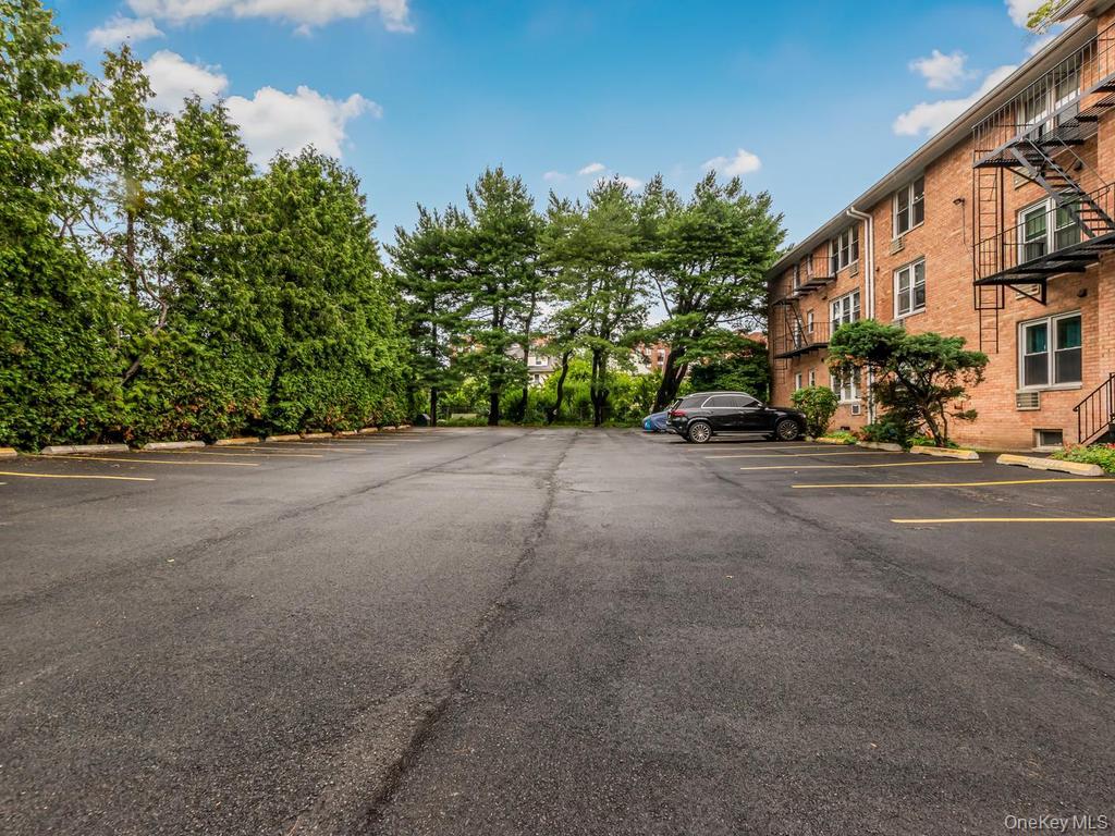 25 Trinity Place, Unit 3J New Rochelle, NY 10805 - Photo 12 of 15 Back Parking Lot