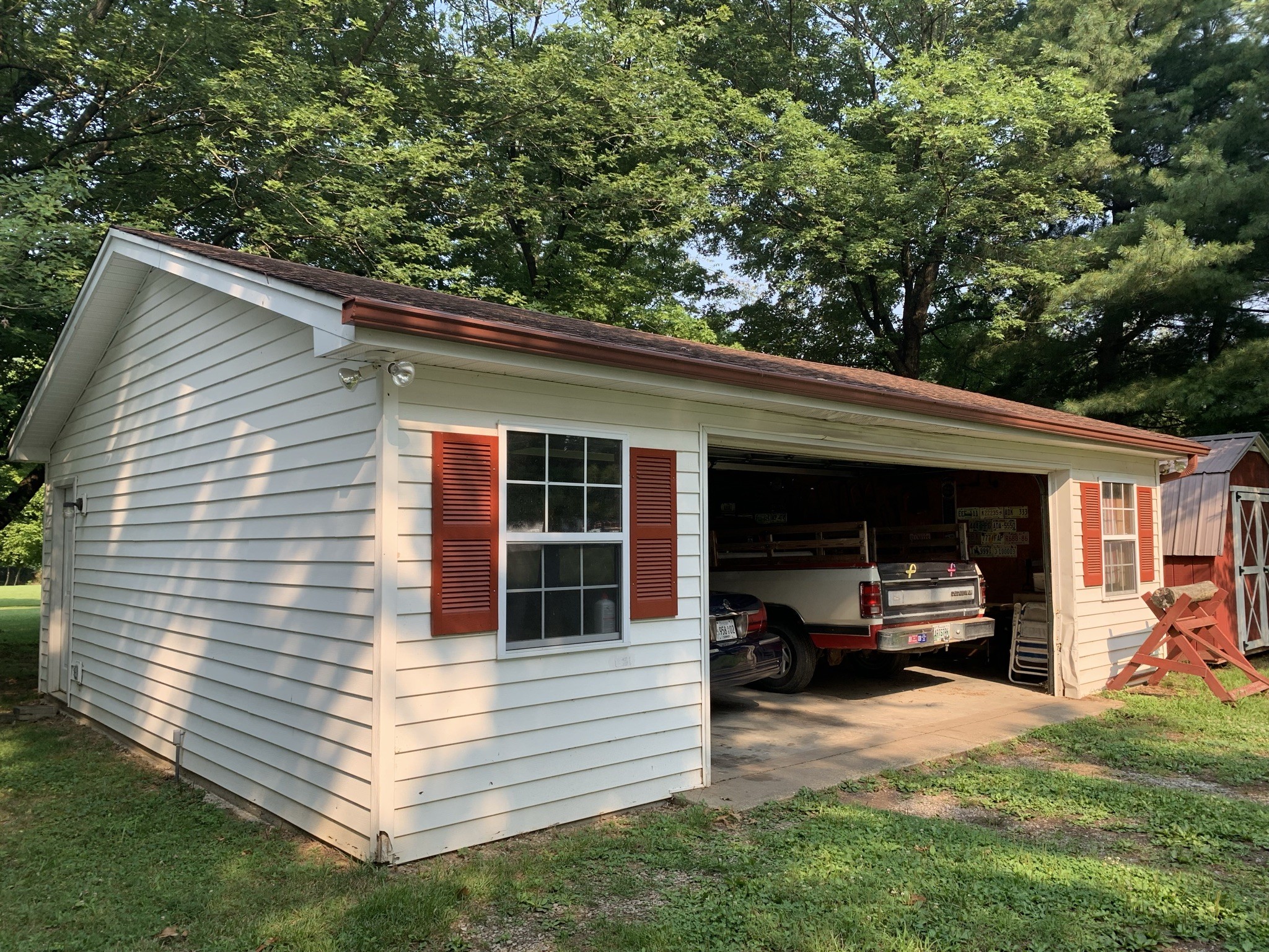 174 T T G T Road Portland, TN 37148 - Photo 16 of 17 a view of house with backyard and seating area