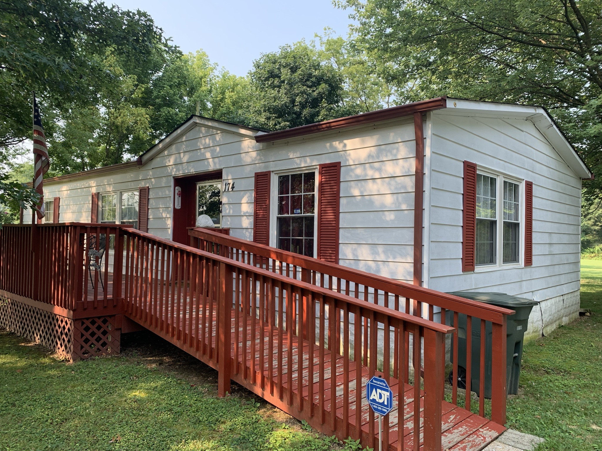 174 T T G T Road Portland, TN 37148 - Photo 17 of 17 a view of a house with a yard and deck