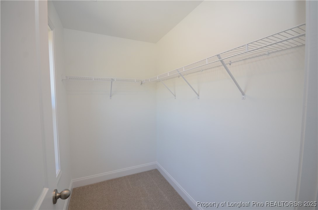 2937 Lemuel Black Road Spring Lake, NC 28390 - Photo 16 of 32 a view of a room with racks on the wall