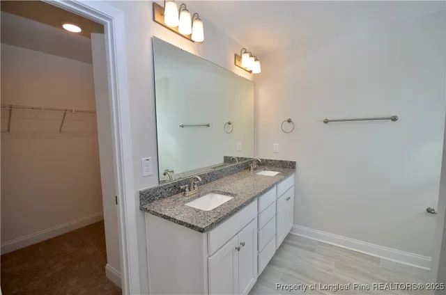 a bathroom with a shower a toilet and a shower