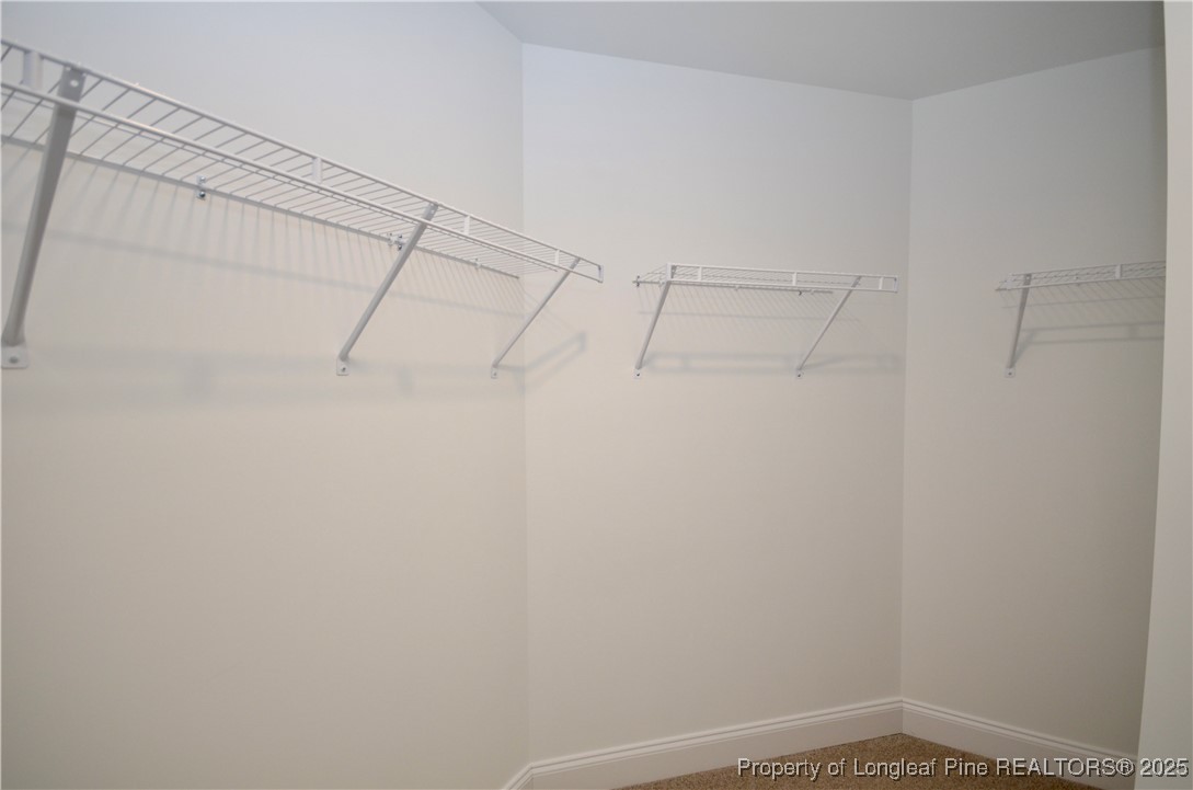 2937 Lemuel Black Road Spring Lake, NC 28390 - Photo 27 of 32 a view of a room with racks on the wall