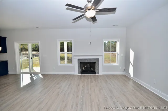 a view of a kitchen with furniture and a fireplace