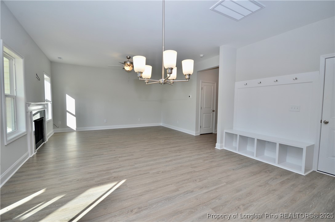 2937 Lemuel Black Road Spring Lake, NC 28390 - Photo 9 of 32 wooden floor in an empty room with a window