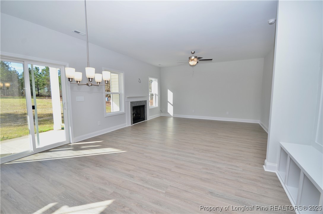 2937 Lemuel Black Road Spring Lake, NC 28390 - Photo 10 of 32 wooden floor in an empty room with a window