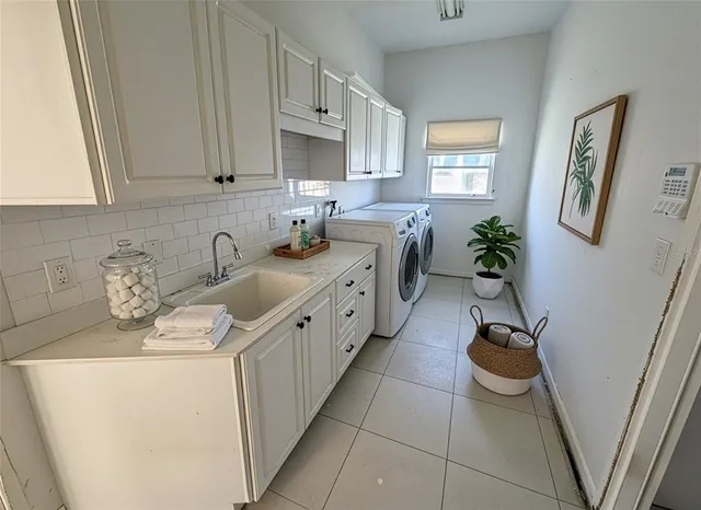 an aerial view of a house with outdoor space