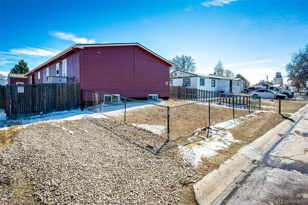 a view of backyard of a house