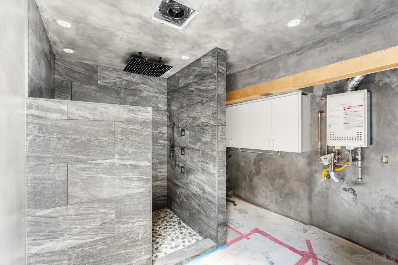 843 Tenth Avenue, Unit A & B San Diego, CA 92101 - Photo 40 of 75 a bathroom with a shower