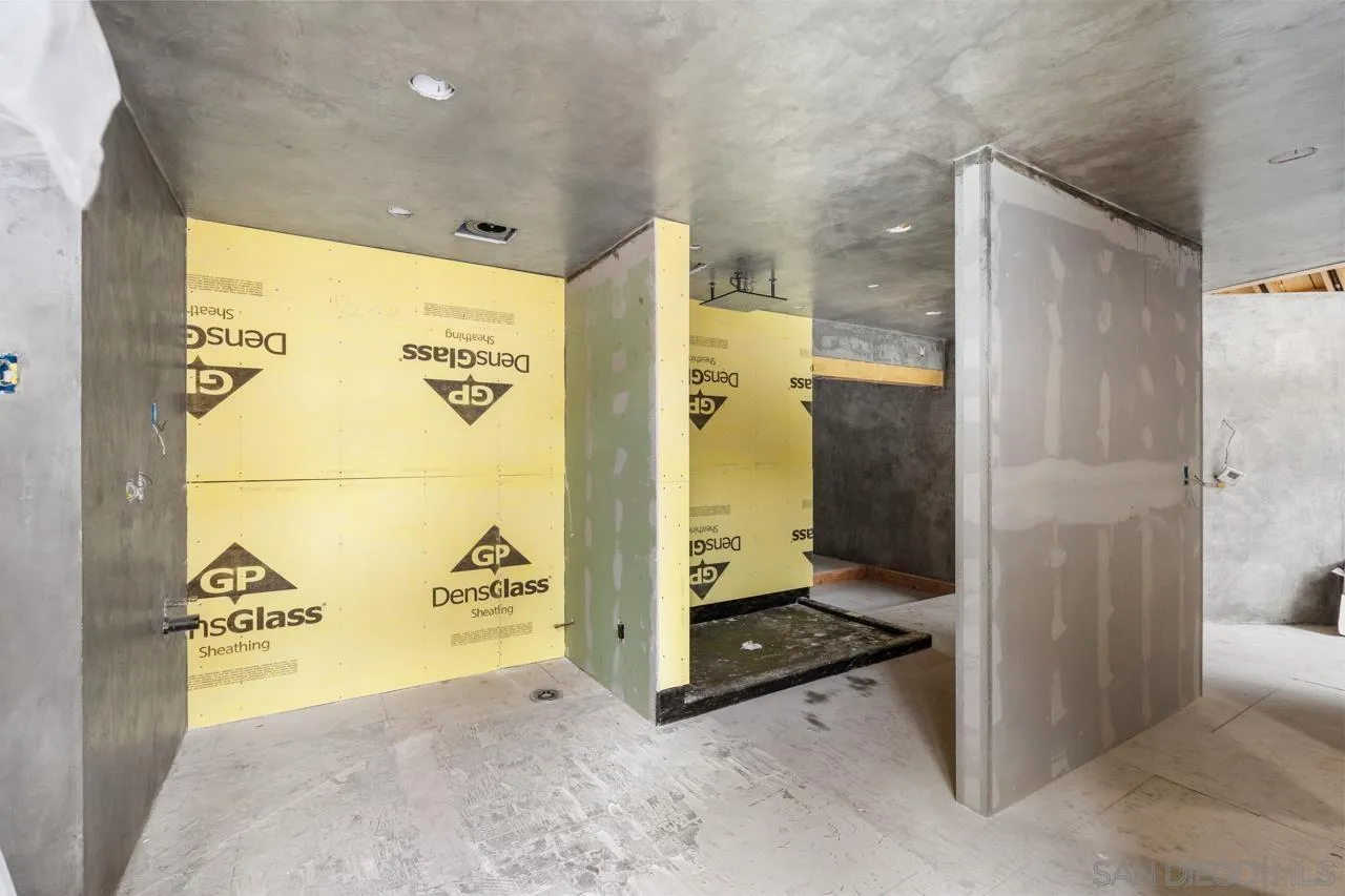 843 Tenth Avenue, Unit A & B San Diego, CA 92101 - Photo 50 of 75 a view of a bathroom with a shower and a sink
