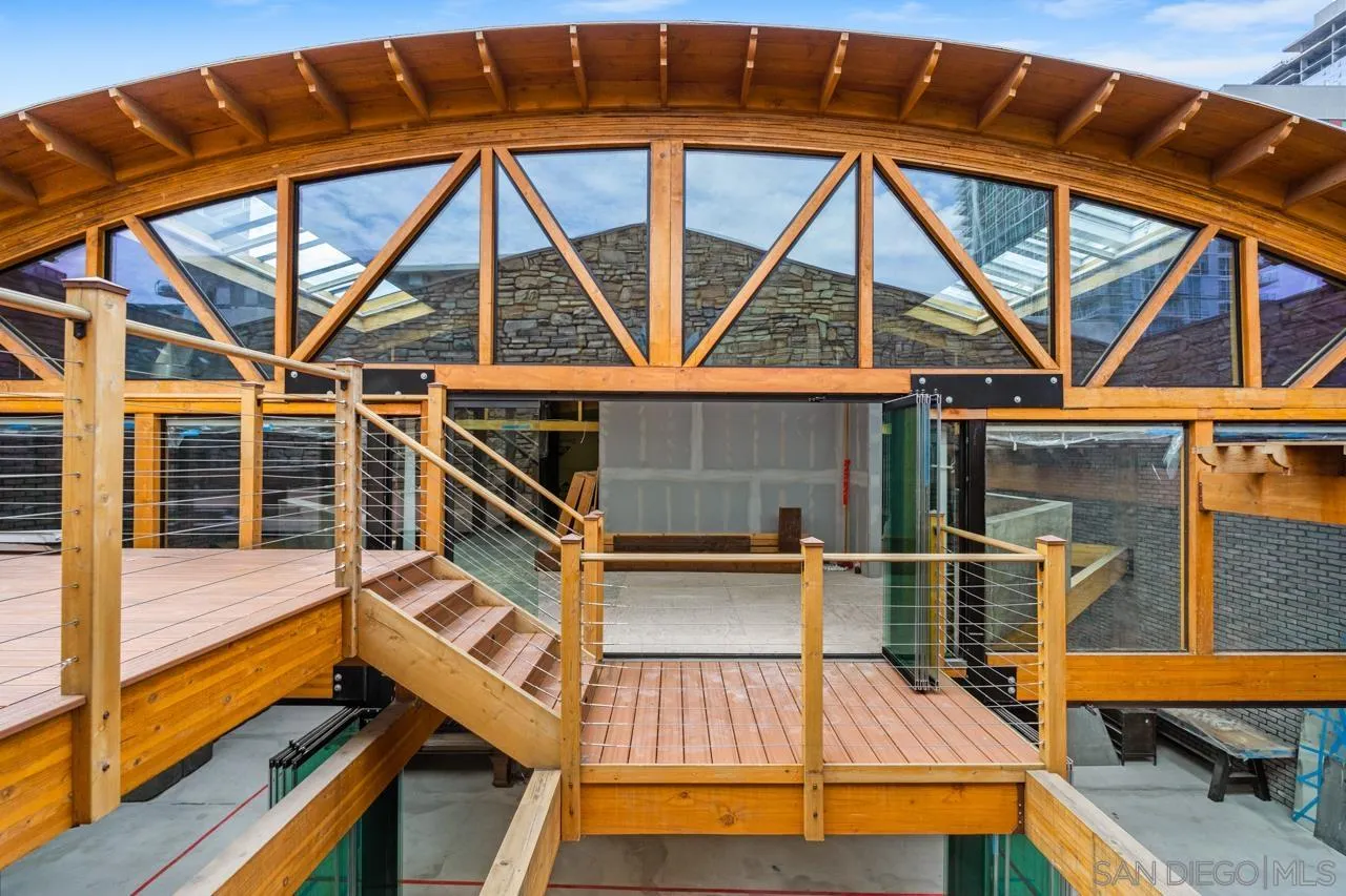 843 Tenth Avenue, Unit A & B San Diego, CA 92101 - Photo 5 of 75 a view of room with wooden deck and furniture