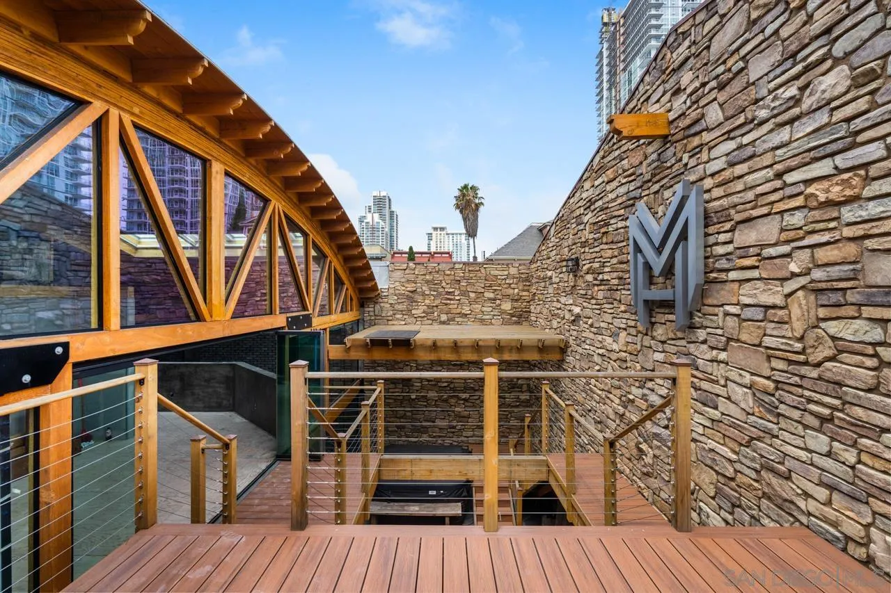 843 Tenth Avenue, Unit A & B San Diego, CA 92101 - Photo 59 of 75 a view of balcony with wooden floor and fence