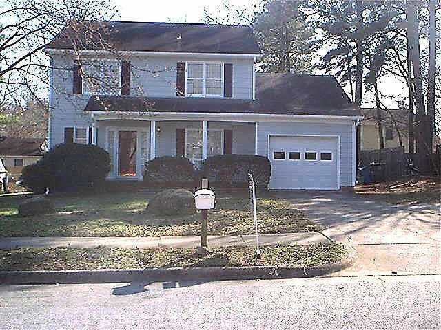 3720 Dusty Lane Raleigh, NC 27604 - Photo 1 of 11 a front view of a house with garden