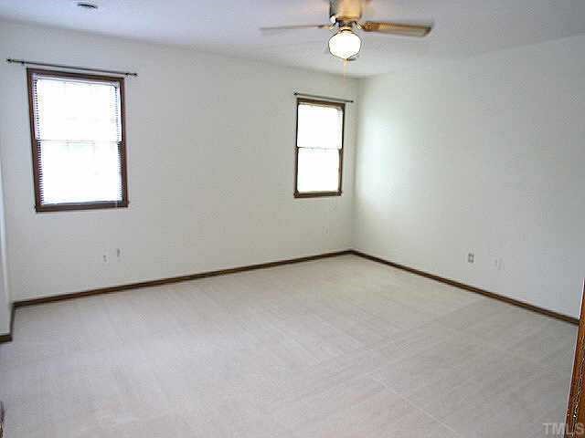 3720 Dusty Lane Raleigh, NC 27604 - Photo 7 of 11 an empty room with a window