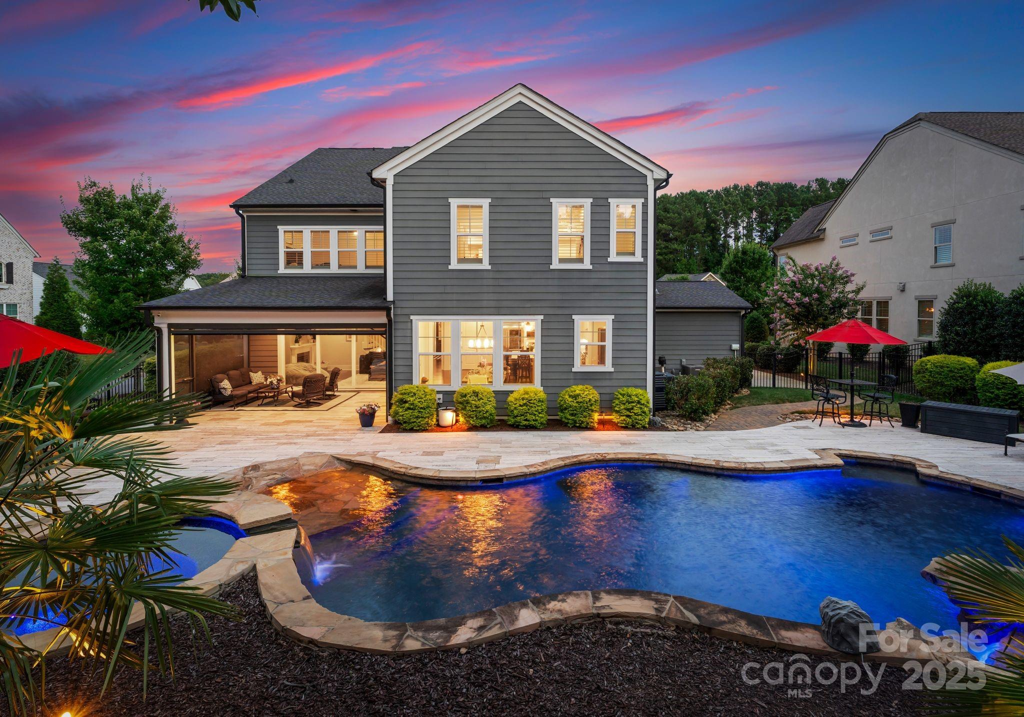 9043 Golden Rock Lane Huntersville, NC 28078 - Photo 1 of 48 a front view of a house with yard and outdoor seating