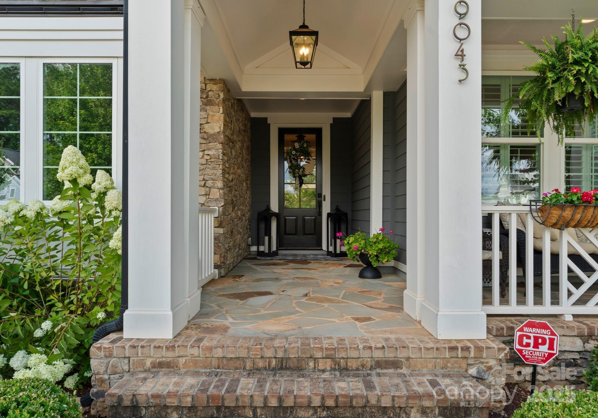 9043 Golden Rock Lane Huntersville, NC 28078 - Photo 12 of 48 a view of a entryway door front of house