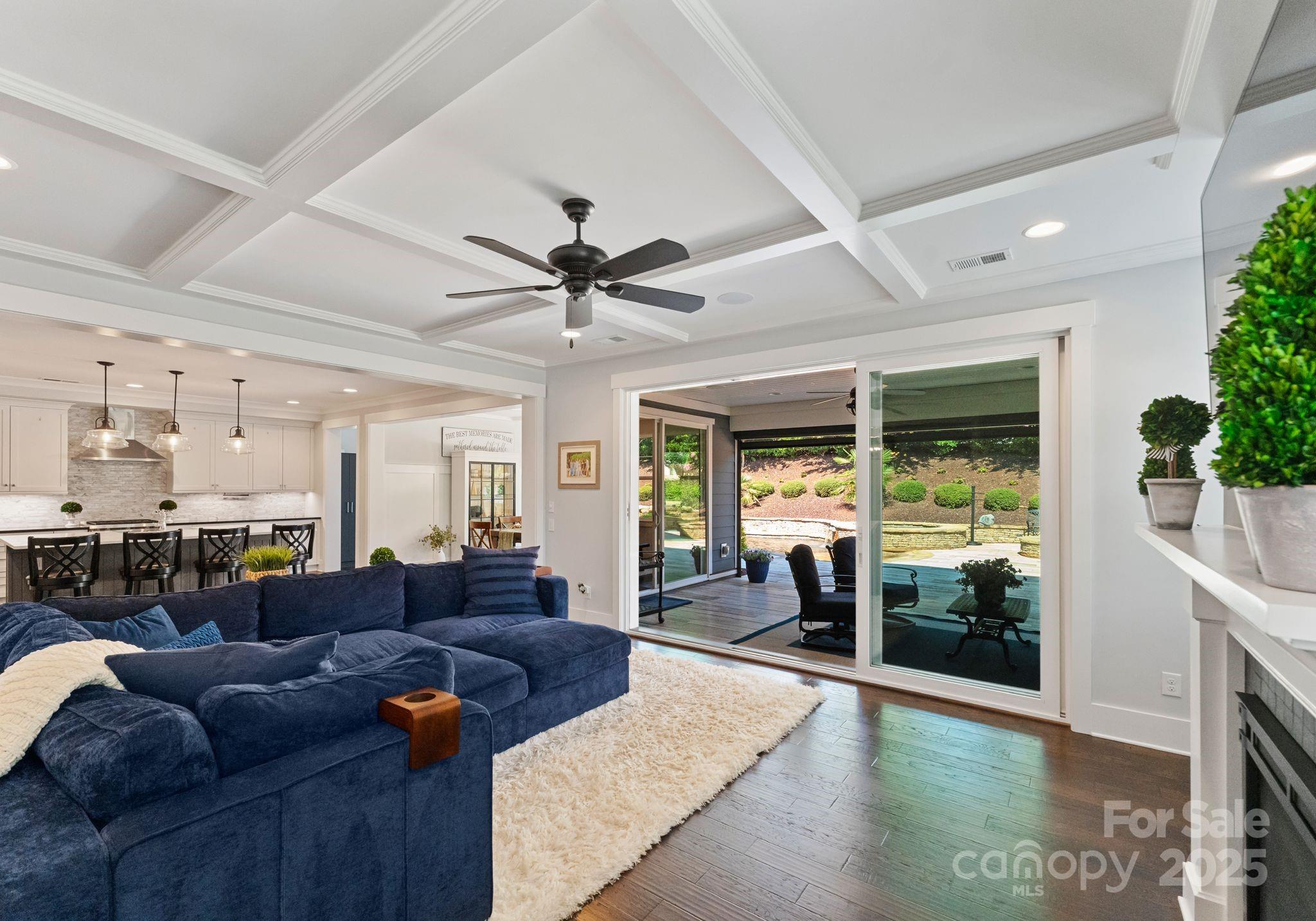 9043 Golden Rock Lane Huntersville, NC 28078 - Photo 20 of 48 a living room with furniture and a large window