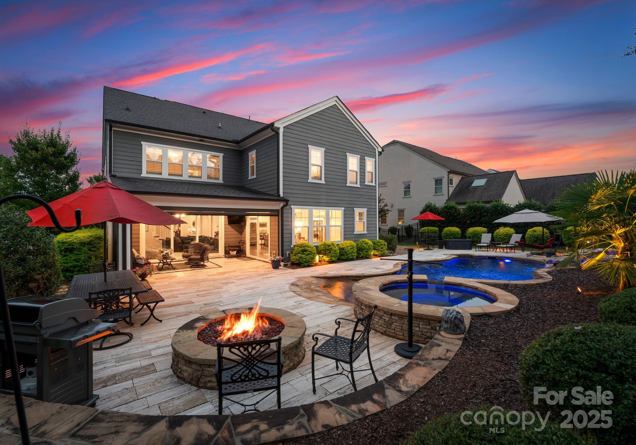 9043 Golden Rock Lane Huntersville, NC 28078 - Photo 2 of 48 a view of a house with backyard and sitting area
