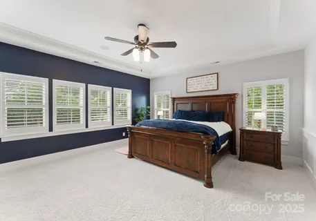 a view of kitchen with granite countertop sink and natural light