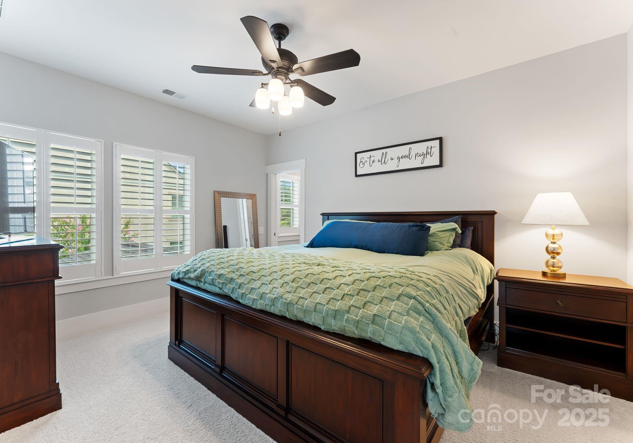 9043 Golden Rock Lane Huntersville, NC 28078 - Photo 36 of 48 a bedroom with a large bed and a window