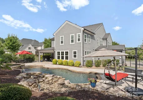 a view of a lake with a house