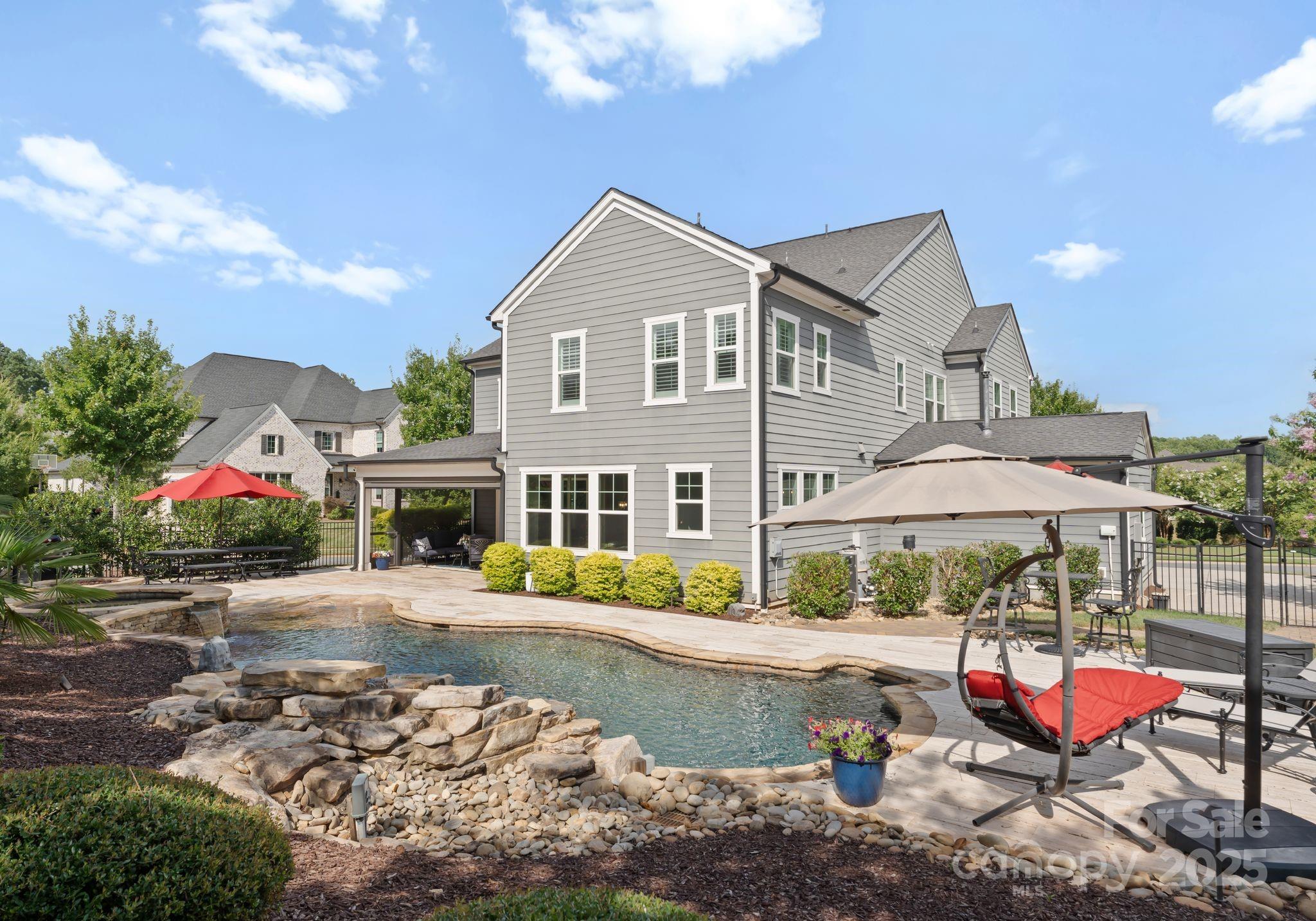 9043 Golden Rock Lane Huntersville, NC 28078 - Photo 43 of 48 a front view of a house with a yard