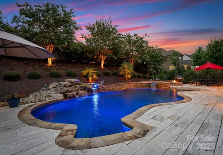 a view of a swimming pool with an outdoor space