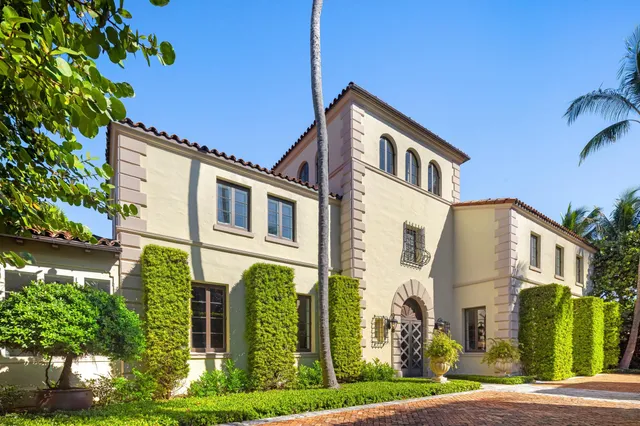 a bedroom with a workspace