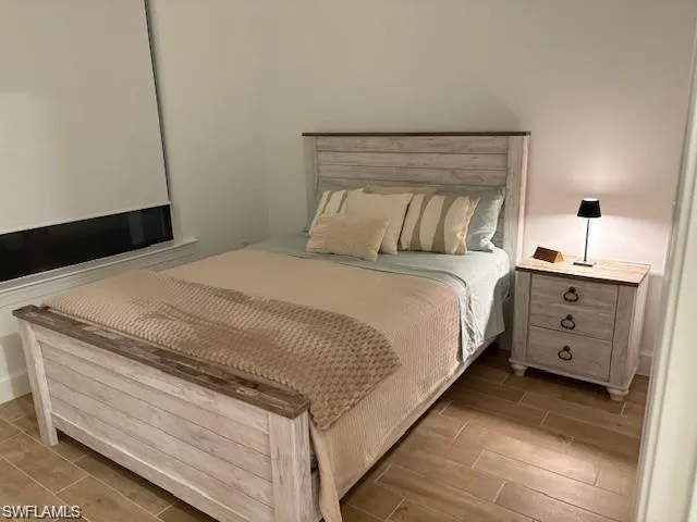 a bathroom with a double vanity sink and mirror