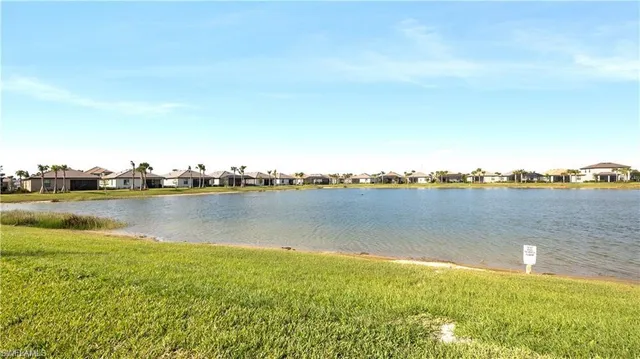 a outdoor dining space with furniture and a potted plant