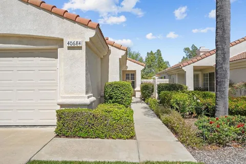 a view of a back yard of the house
