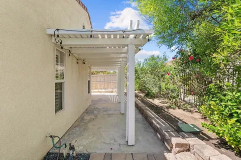 a view of a golf course with chairs