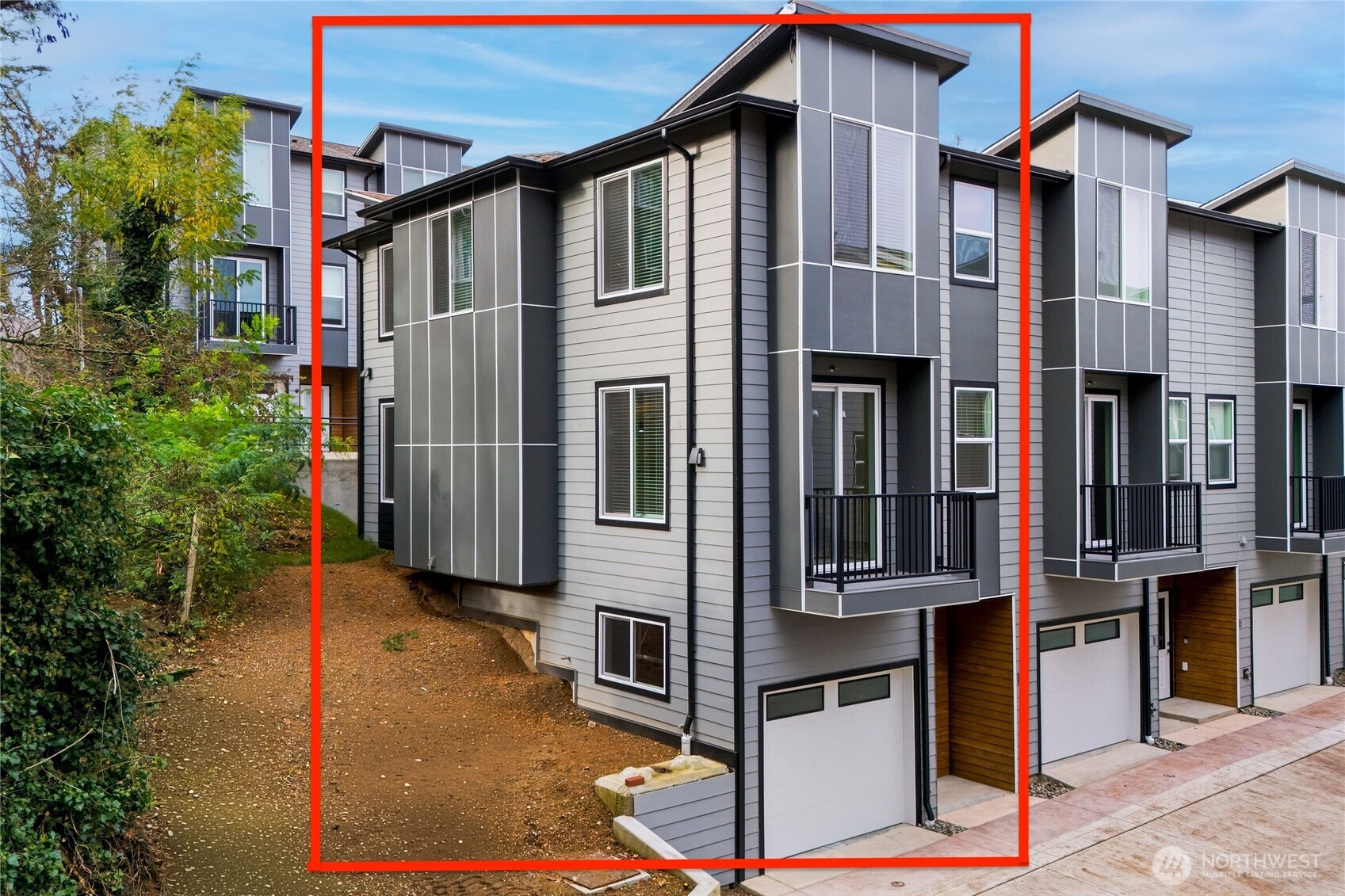 1926 South Washington Street, Unit B206 Tacoma, WA 98405 - Photo 2 of 39 a view of a large building with many windows