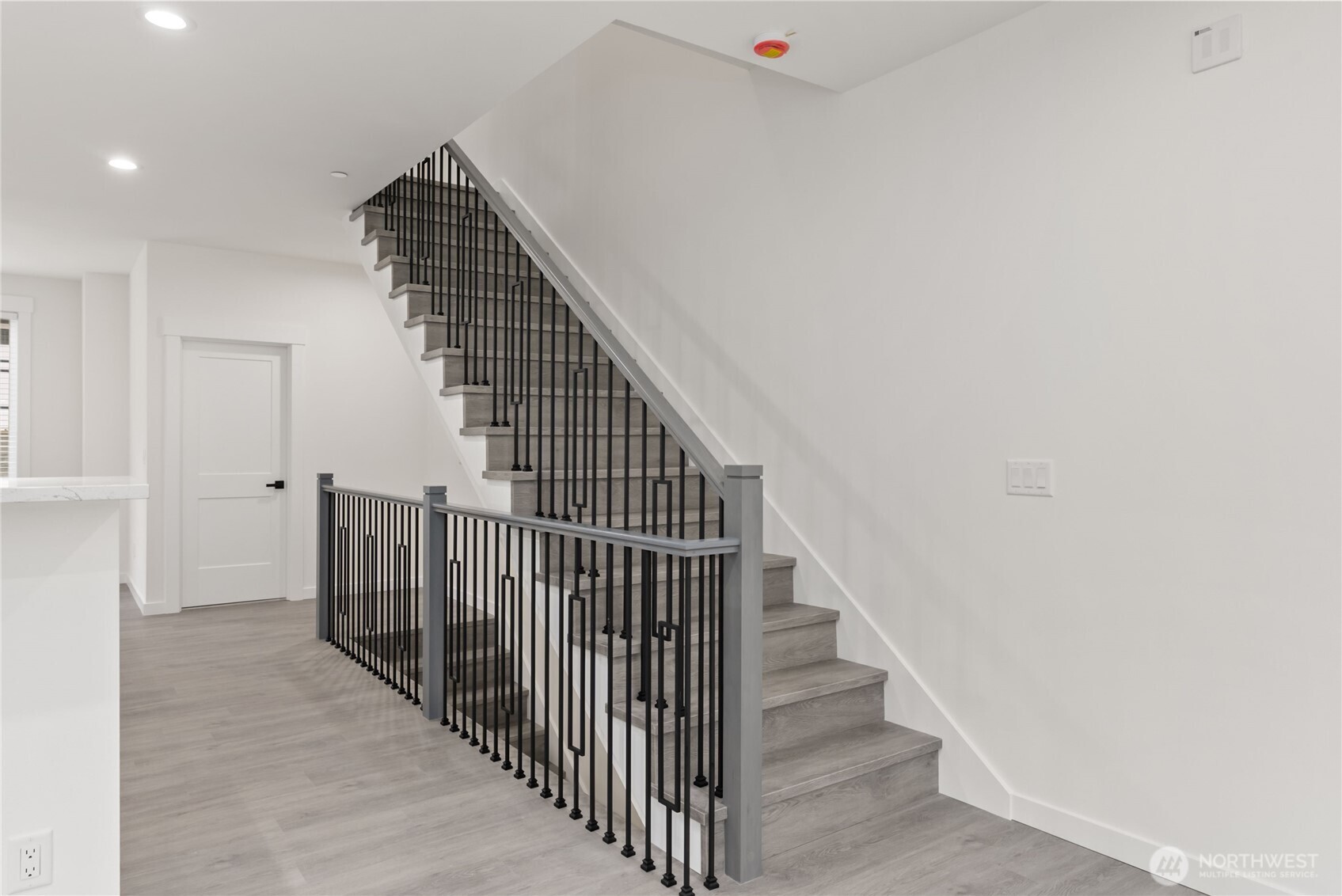1926 South Washington Street, Unit B206 Tacoma, WA 98405 - Photo 22 of 39 a view of entryway and hall with wooden floor