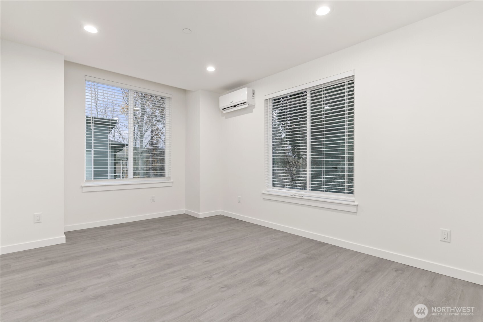 1926 South Washington Street, Unit B206 Tacoma, WA 98405 - Photo 23 of 39 a view of an empty room with wooden floor and a window