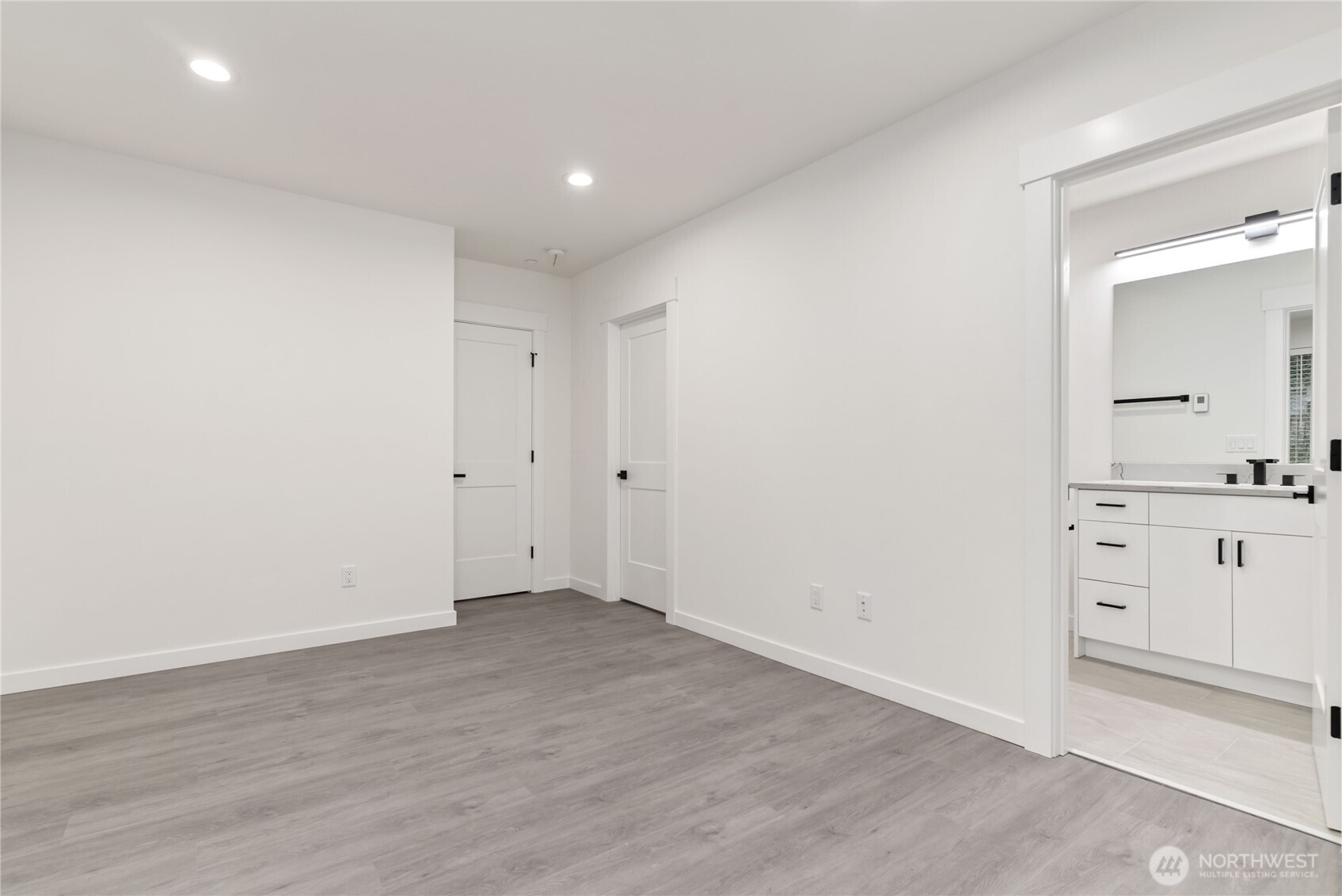 1926 South Washington Street, Unit B206 Tacoma, WA 98405 - Photo 24 of 39 wooden floor in an empty room
