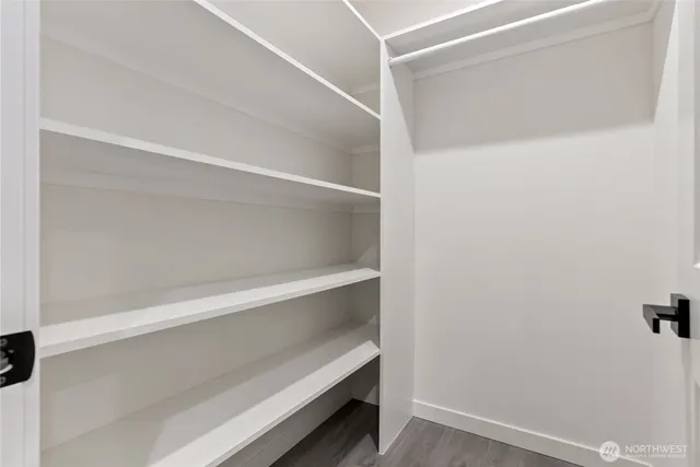 a view of an empty walk in closet
