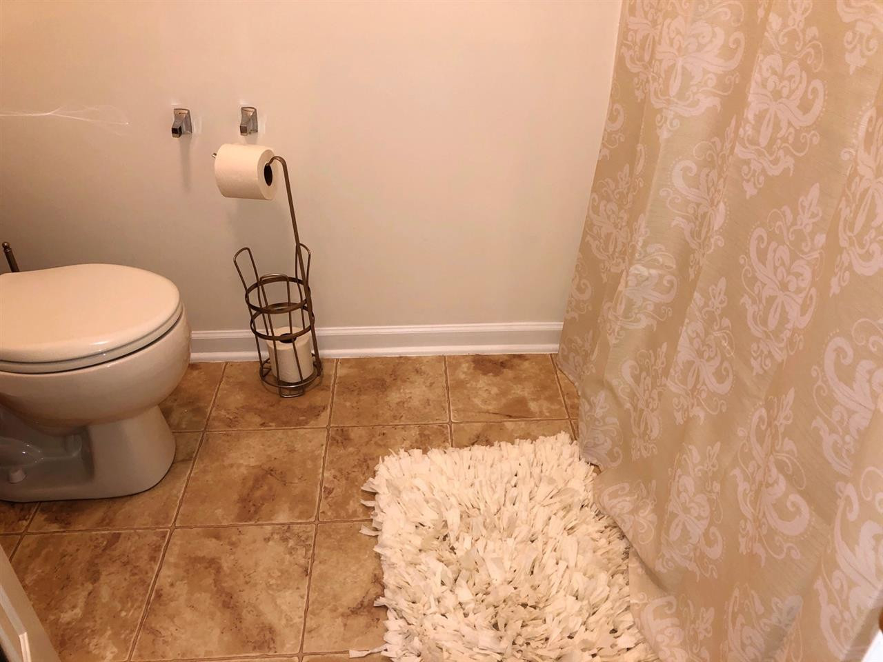 5400 Glass Ridge Road Raleigh, NC 27616 - Photo 20 of 30 Neutral Colors in the 2nd floor guest bathroom 2nd floor hall bathroom