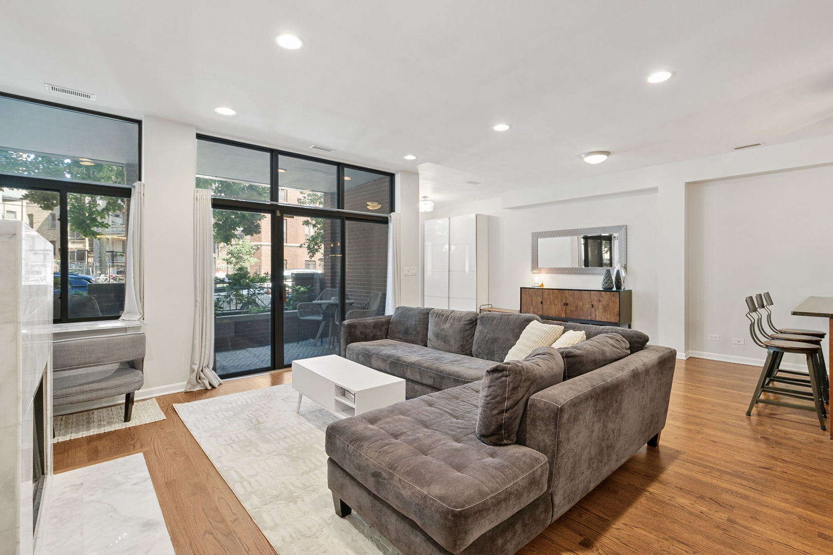 2518 North Willetts Court, Unit GS Chicago, IL 60647 - Photo 14 of 34 a living room with furniture and a large window