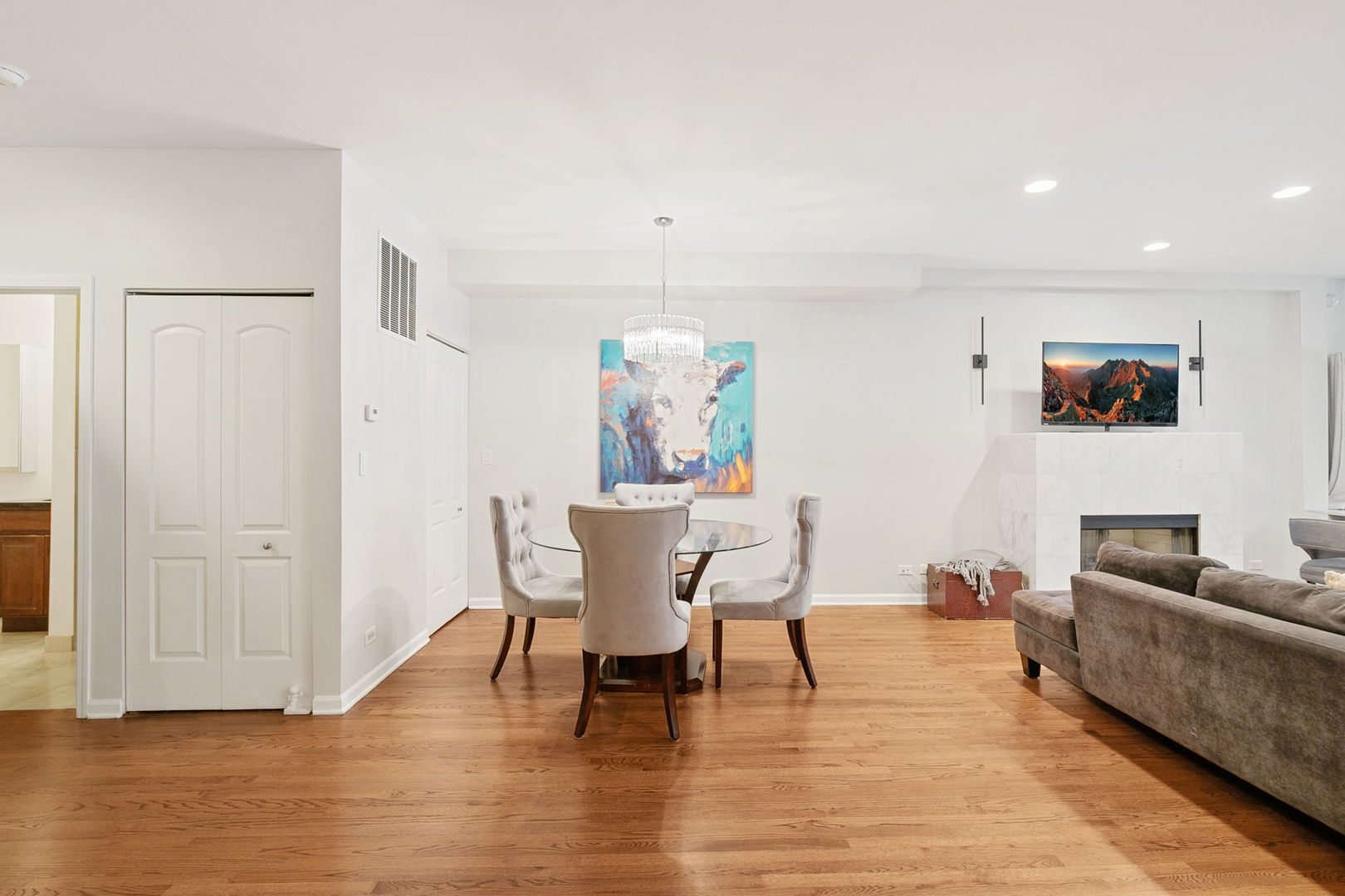 2518 North Willetts Court, Unit GS Chicago, IL 60647 - Photo 20 of 34 a living room with furniture and a dining table with wooden floor