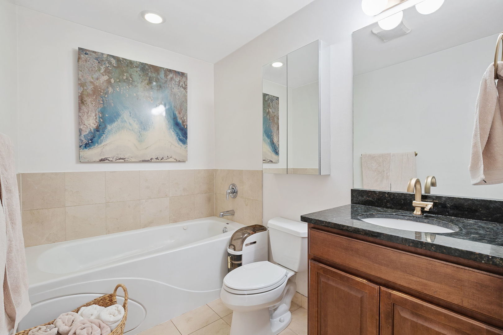 2518 North Willetts Court, Unit GS Chicago, IL 60647 - Photo 31 of 34 a bathroom with a granite countertop sink a toilet and a bathtub