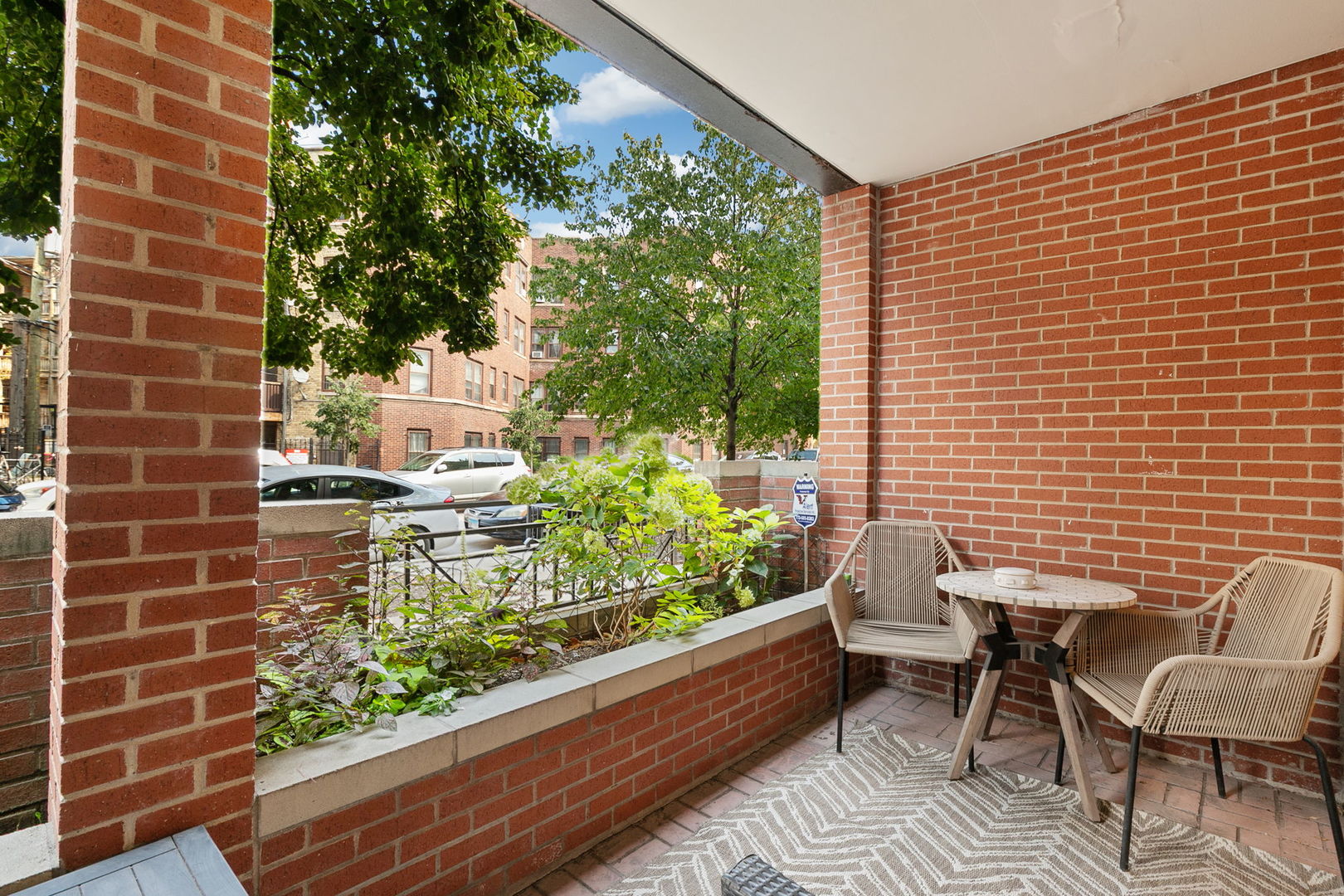 2518 North Willetts Court, Unit GS Chicago, IL 60647 - Photo 5 of 34 a balcony with table and chairs