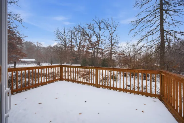 a front view of a house with a garage